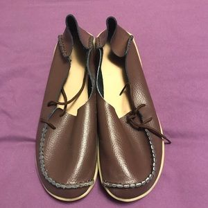 Leather ‘moccasins’ with rubber bottoms